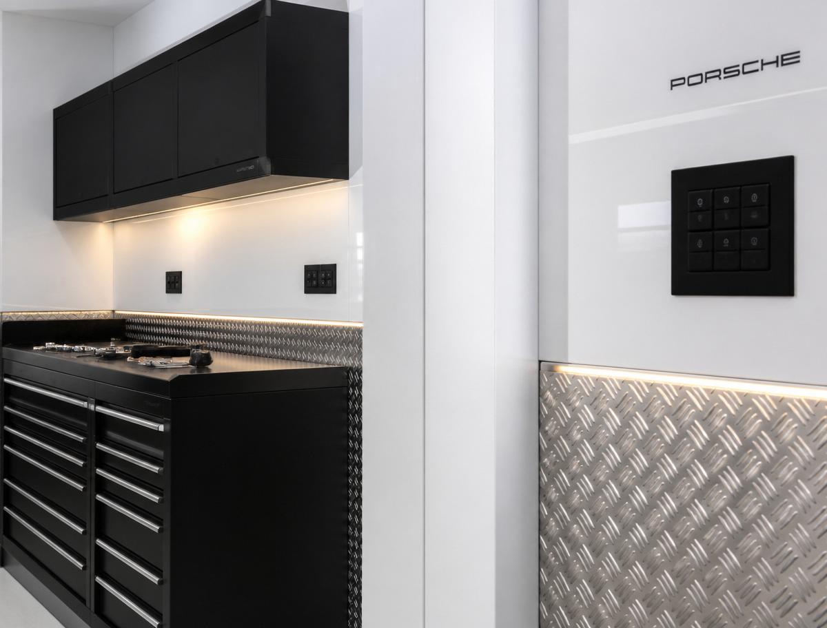 Black garage cabinets with checker plate