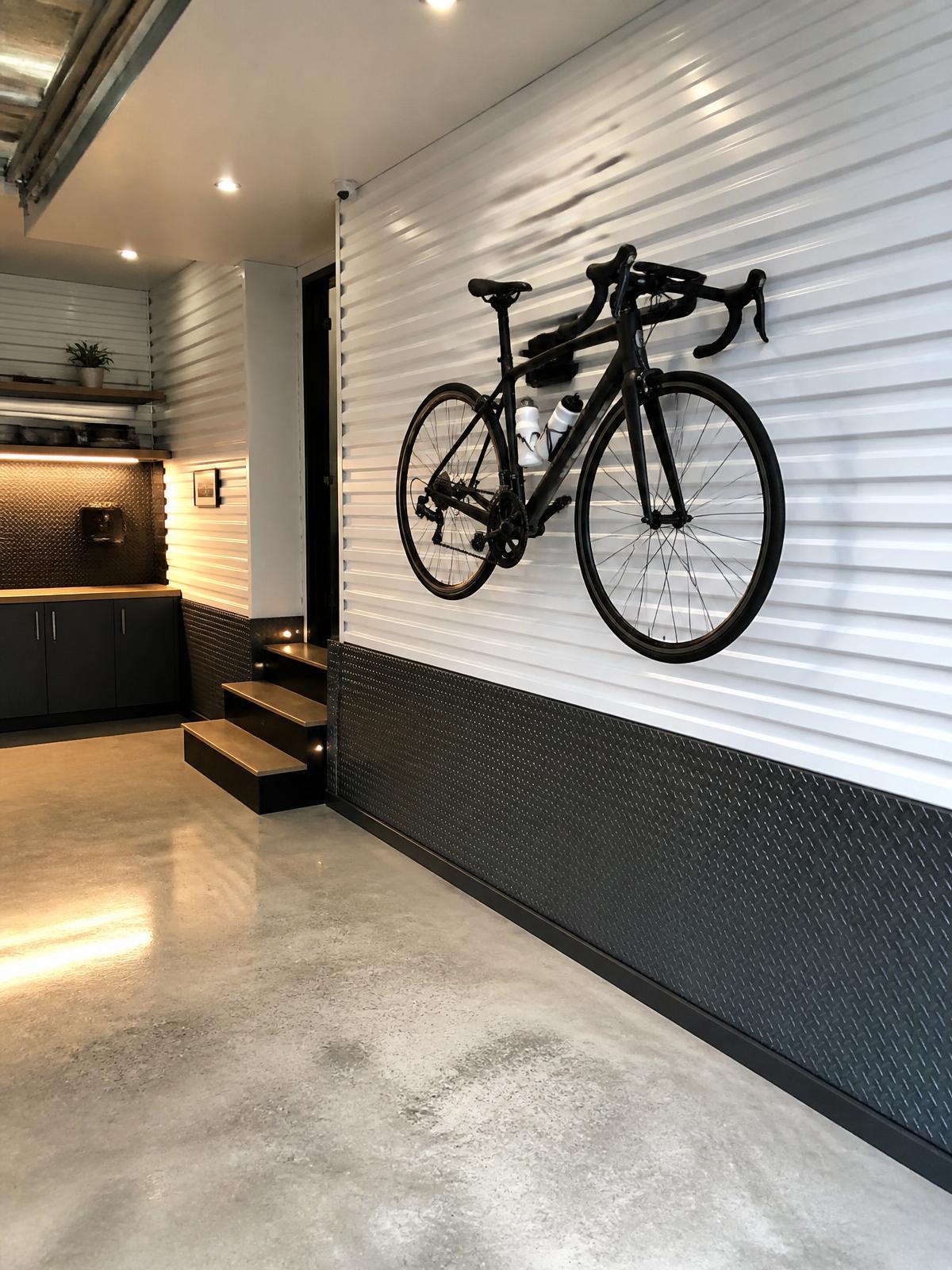 Wall mounted road bike in white garage